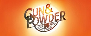 Gun & Power in dark stylized letters on an orange sunburst background