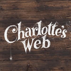 The title Charlotte's Web in white text against a brown wood paneled background. A spider dangles from the C